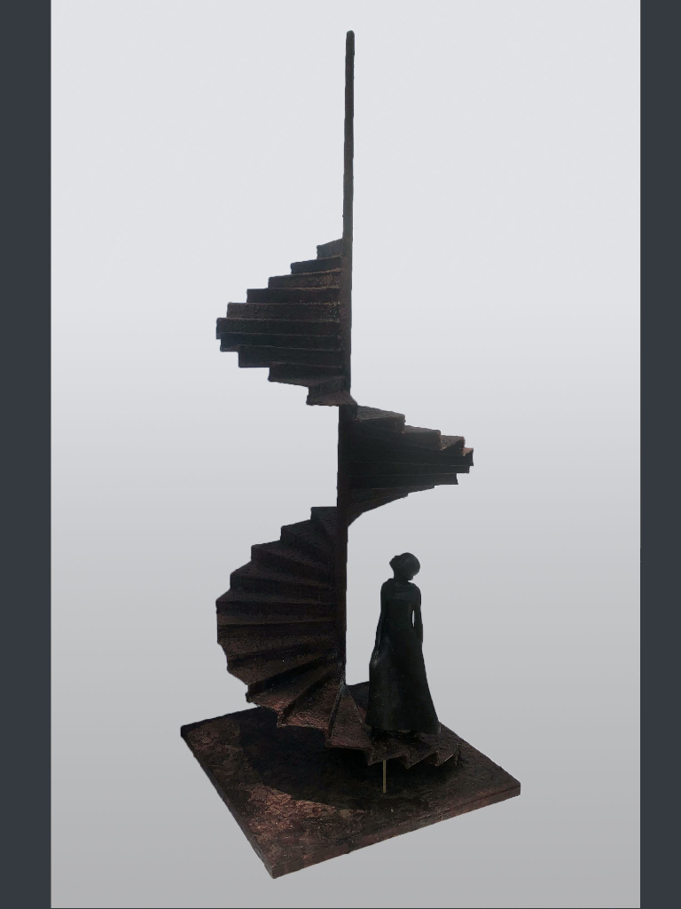 Figure at the foot of a spiral staircase.